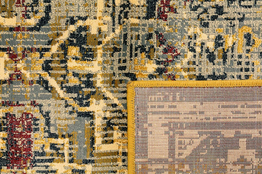 Traditional area rug with beige, navy, and red geometric pattern and ornate border