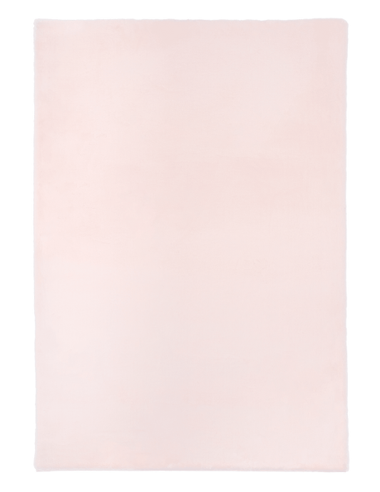 Blush pink shag area rug with soft dense pile and clean stitched edges