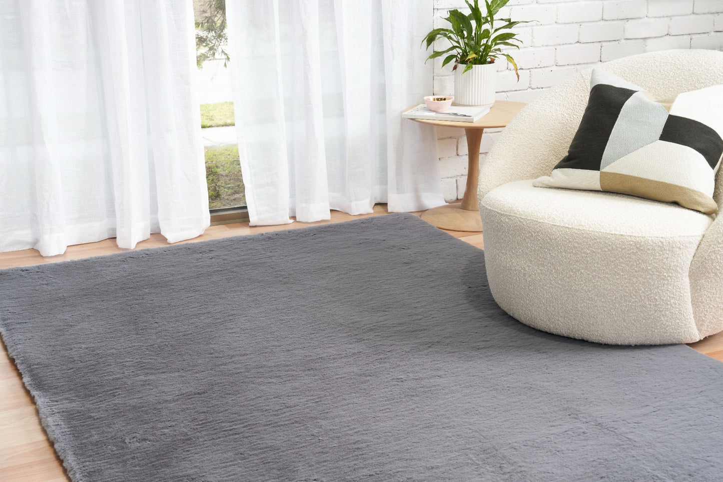 Koala-inspired feel grey rug by Celine, adds comfort and style to any living space
