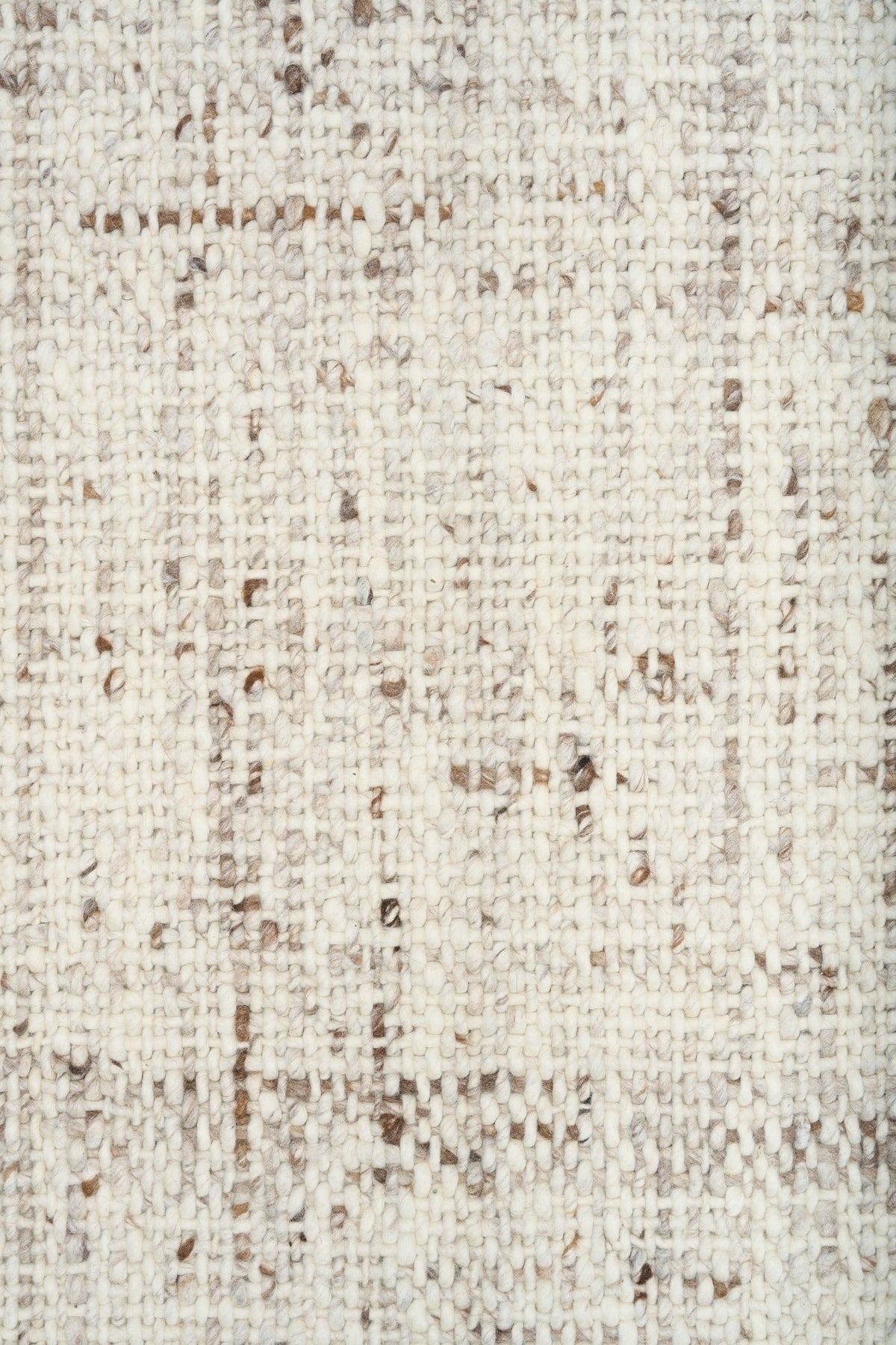 Beige textured rug close-up of speckled woven surface