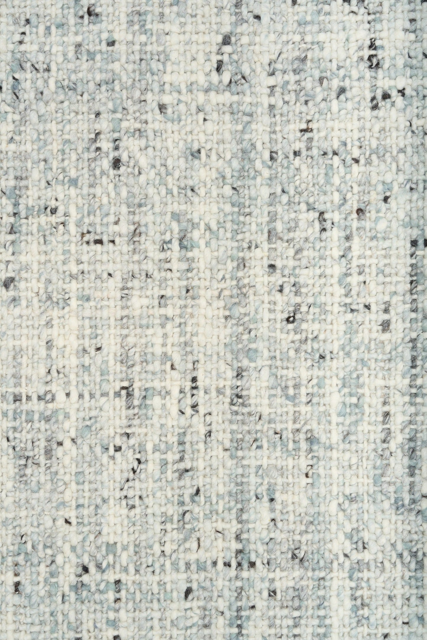 Cleo Blue textured area rug, light blue with speckled pattern