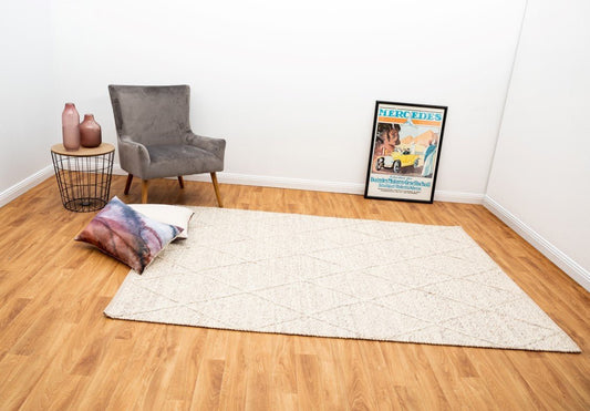 Light grey wool area rug with geometric trellis design