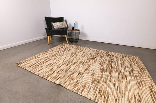 Natural wool large area rug with beige and tan striped woven pattern
