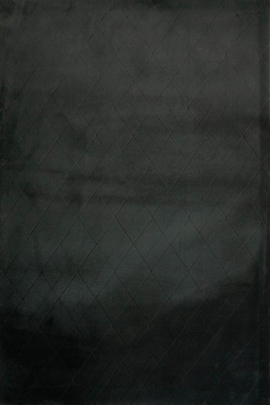 Charcoal rug surface with subtle diamond grid texture