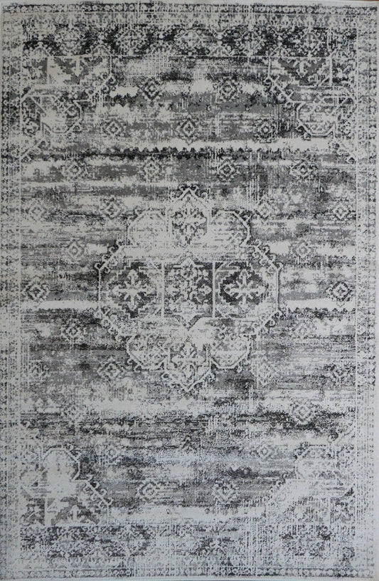 Grey modern area rug with distressed geometric medallion pattern