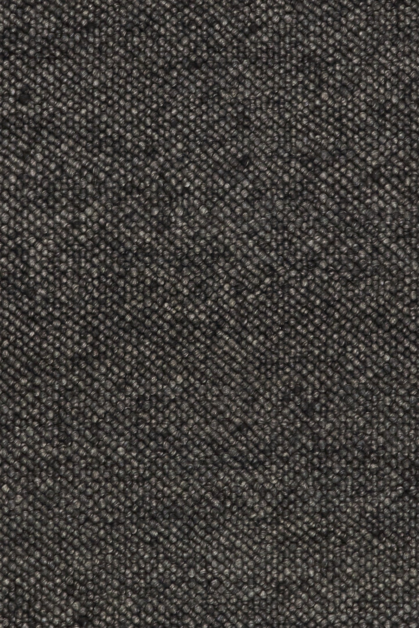 Charcoal textured woven rug surface detail