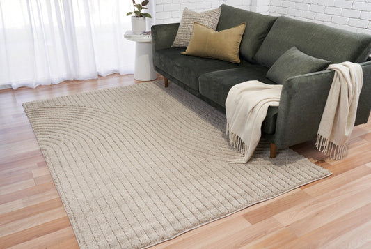 Beige modern textured area rug with linear stripe pattern, rectangular layout