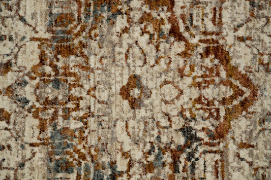 Textured floor rug close-up with beige fibers and rust-brown abstract motifs