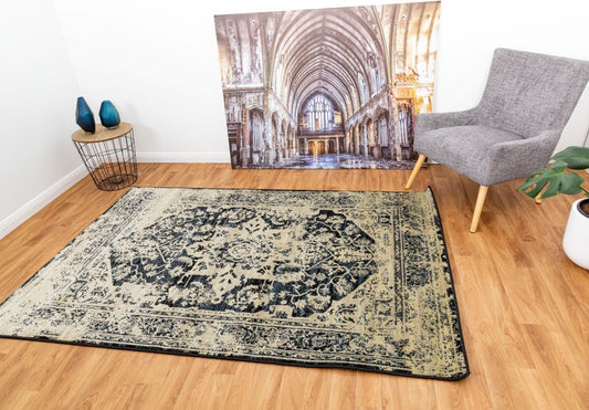 Distressed medallion area rug in dark navy on beige, with rounded corners | Raffia carpet 1805 Black Vintage Traditional Living Room Rug - Rugs Point Australia