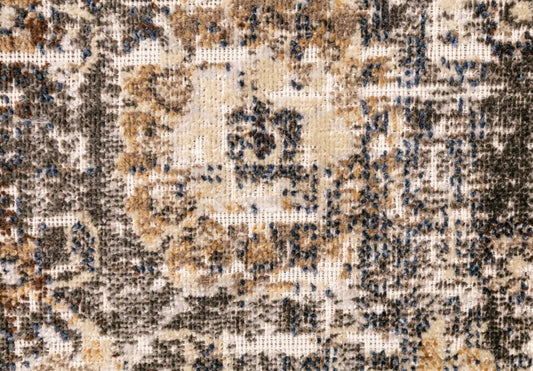 Close-up of abstract distressed rug pattern with gray, tan, and blue woven details. | Zephyr Frost Modern Polypropylene Area Rug - Rugs Point Australia