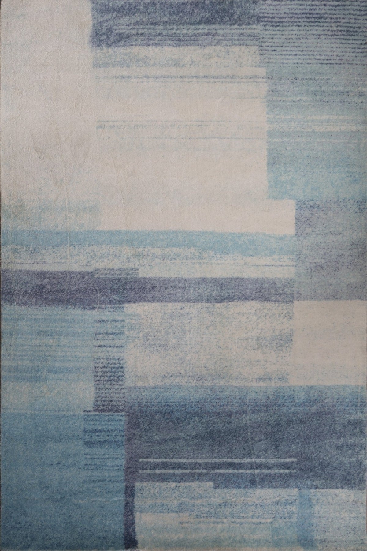 Zoe printed modern medium rug with abstract blue and gray geometric blocks
