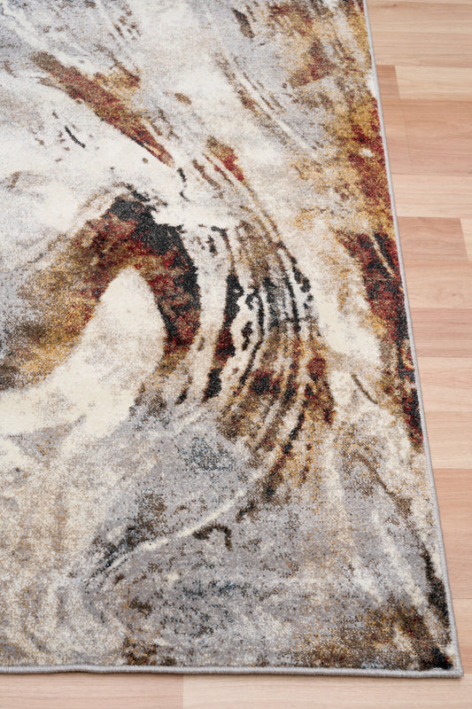 Abstract area rug with multicolor brushstroke design and light bordered edge