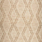 Beige wool area rug with raised geometric X and chevron motifs