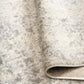 ARUBA 6908 area rug close-up of low-pile distressed abstract light beige and gray texture