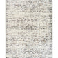 Rectangular light gray area rug with distressed abstract design, flat layout