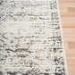 Light gray distressed abstract area rug, rectangular with visible woven texture