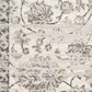 Grey and cream vintage-style area rug with detailed damask motifs and distressed look