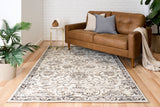 Santo grey area rug with ornate light-and-dark floral damask pattern, flat weave look