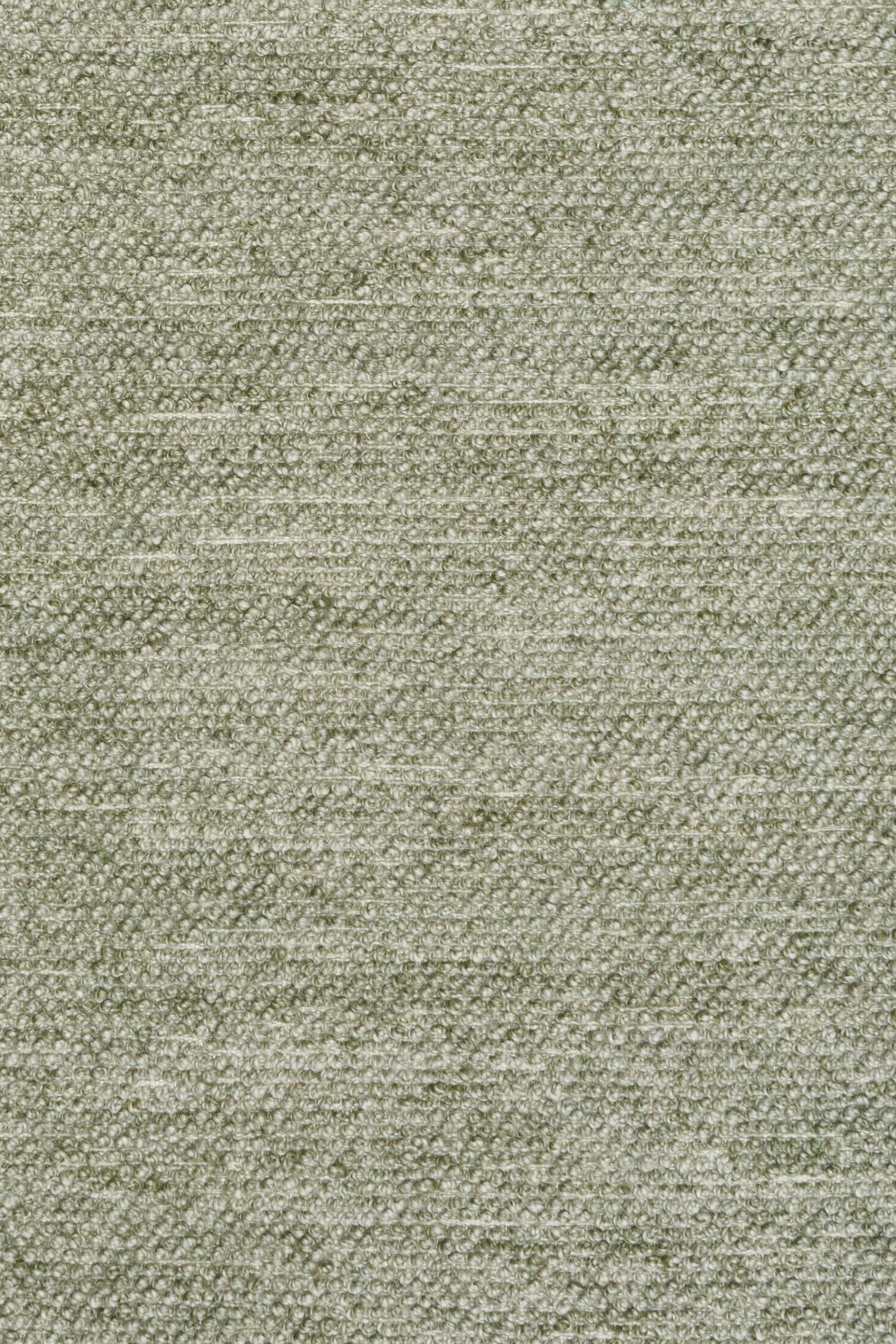 Olive green textured area rug, close-up woven pattern