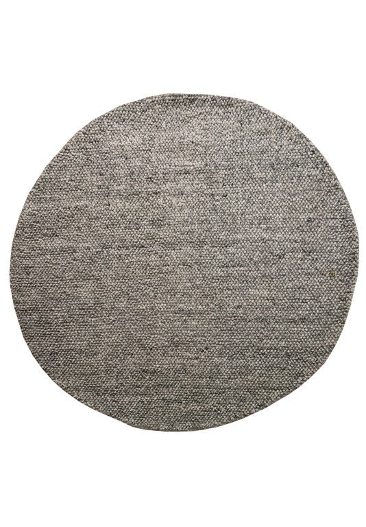 Grey textured round rug sample with speckled woven pattern