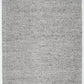 Grey textured area rug, tight speckled woven pattern