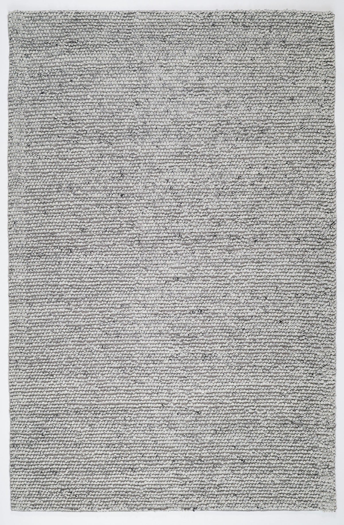 Grey textured area rug, tight speckled woven pattern