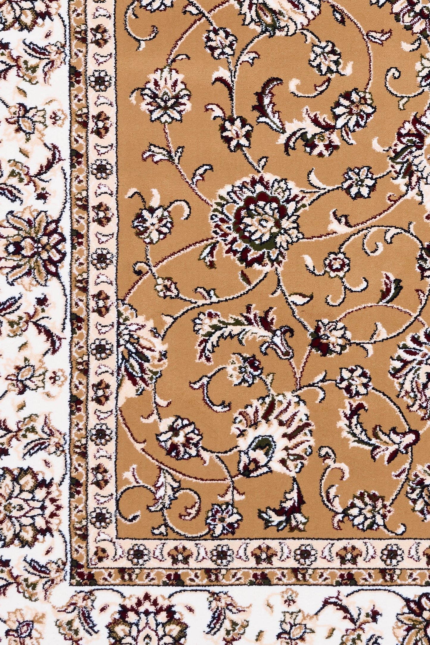 Berber-style rug pattern close-up with tan field, ornate flowers, and cream edge border