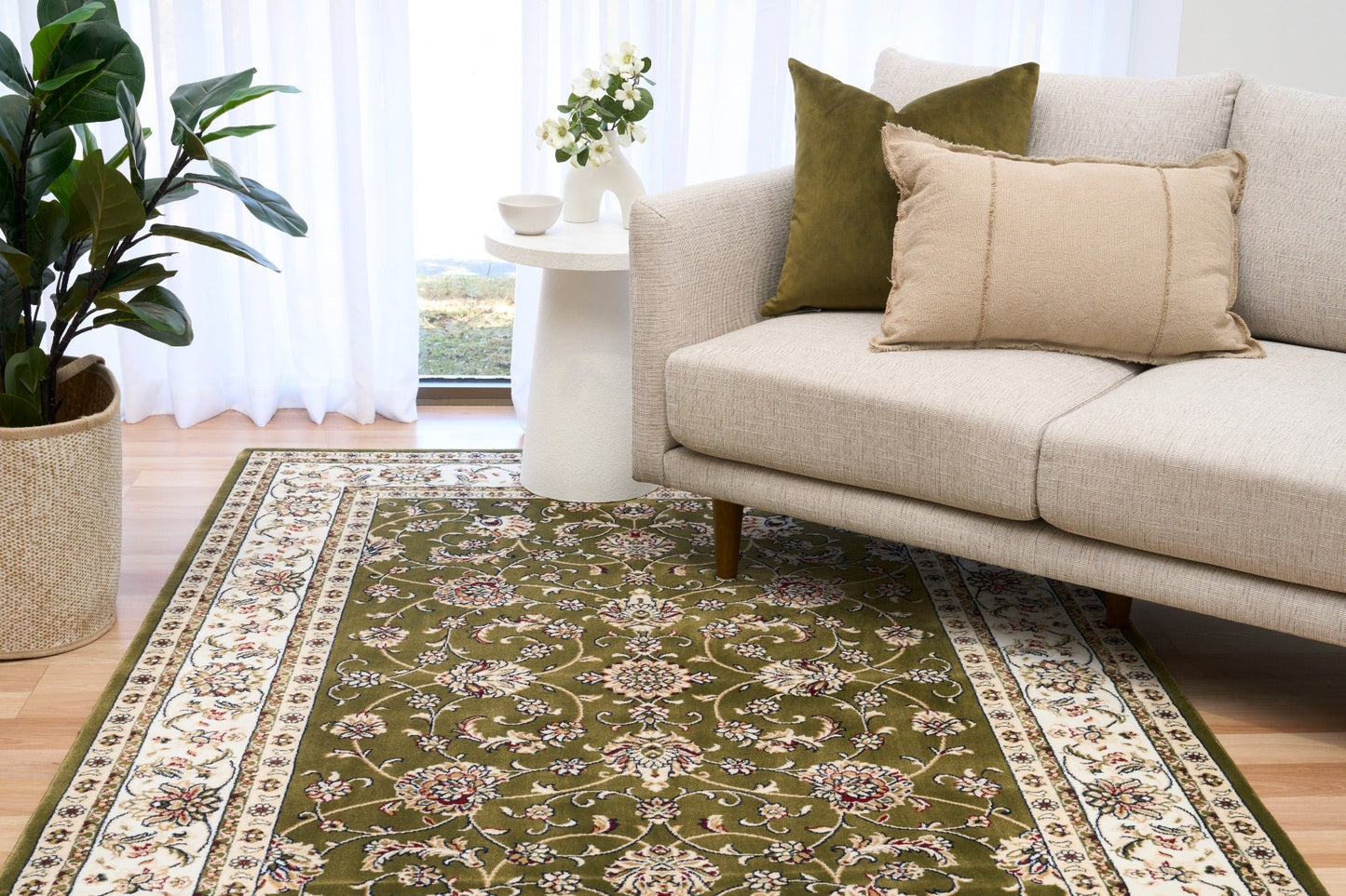 BALUCHI green floral area rug styled on floor with patterned border and center medallion | Baluchi Traditional 300x400cm and all sizes Rug Vintage Traditional Polypropylene Area Rug - Rugs Point Austr
