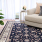 BALUCHI navy area rug with decorative floral pattern and cream striped border