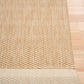Beige woven rug corner with thick folded border and dense loop weave