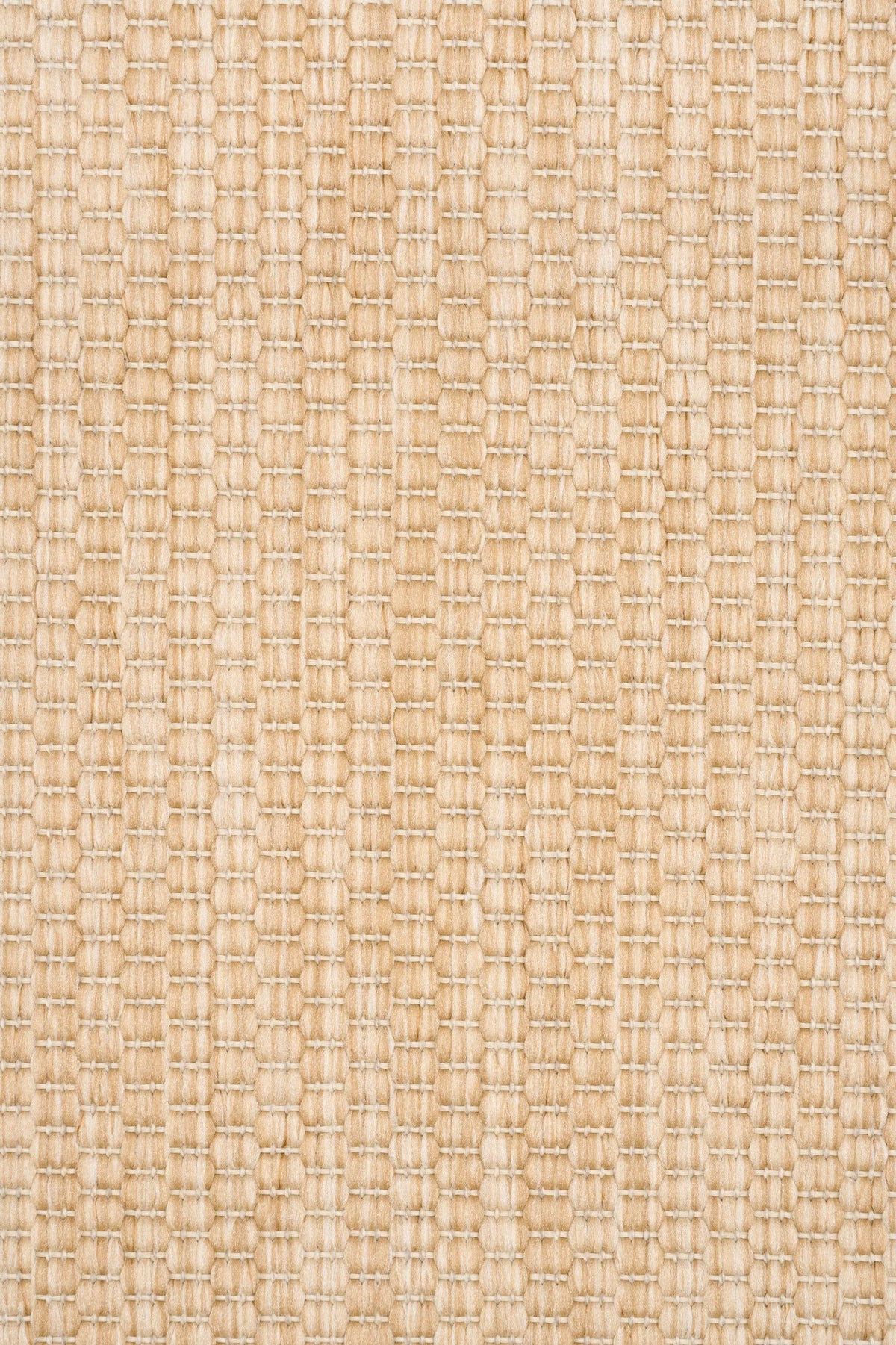Close-up of light beige woven rug fabric with tight rectangular weave pattern