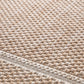 Beige woven area rug with braided edge detail along the border.