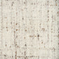 Beige textured rug close-up of speckled woven surface