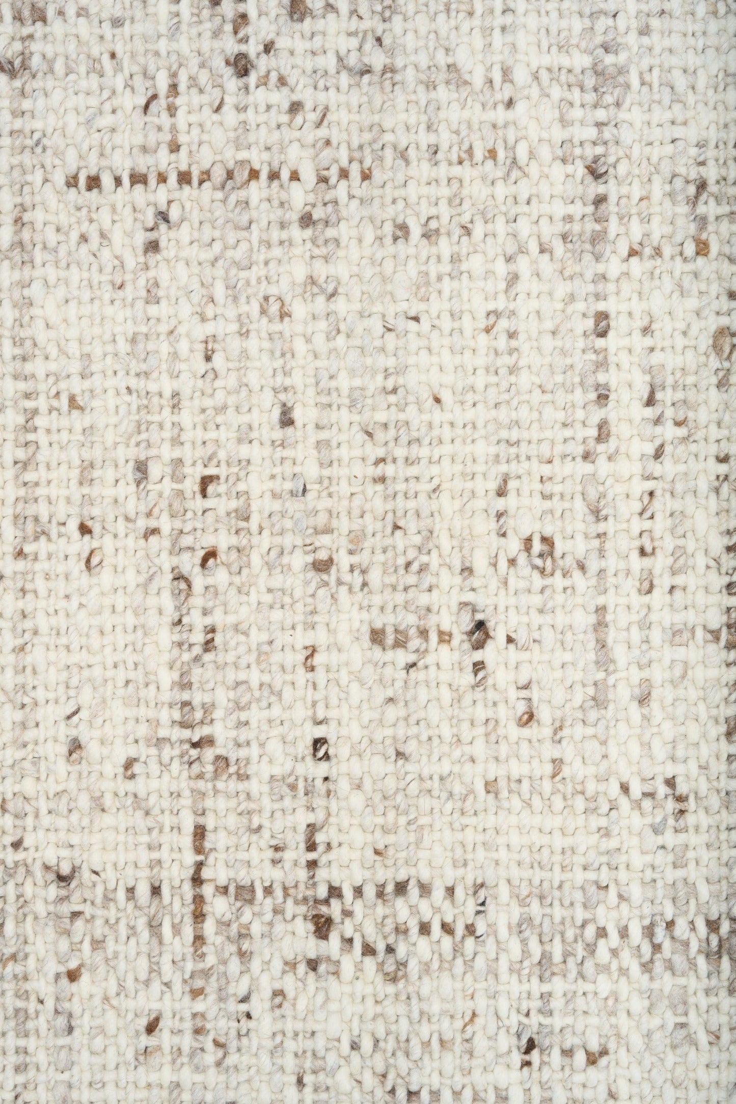 Beige textured rug close-up of speckled woven surface
