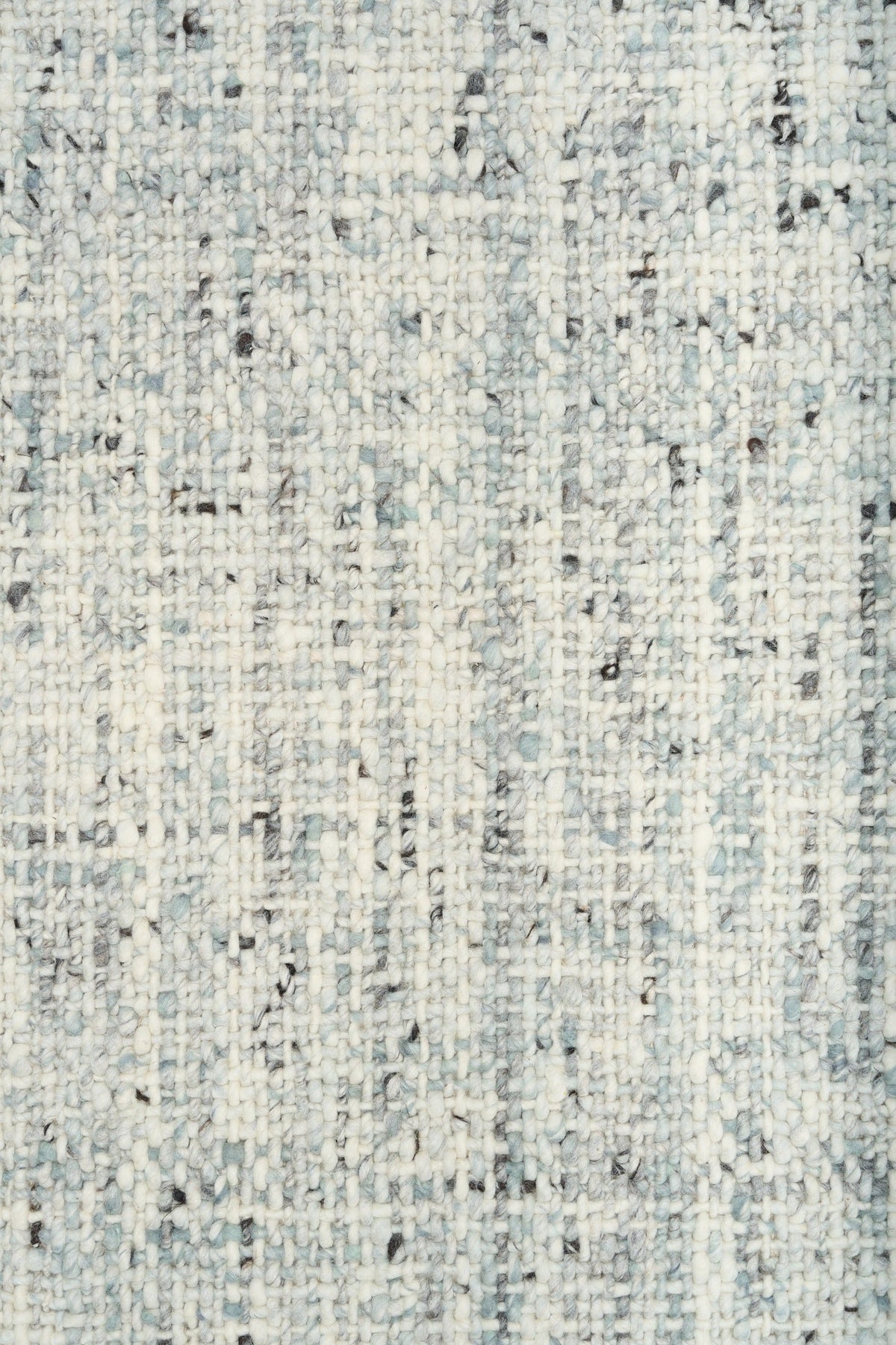 Cleo Blue textured area rug, light blue with speckled pattern