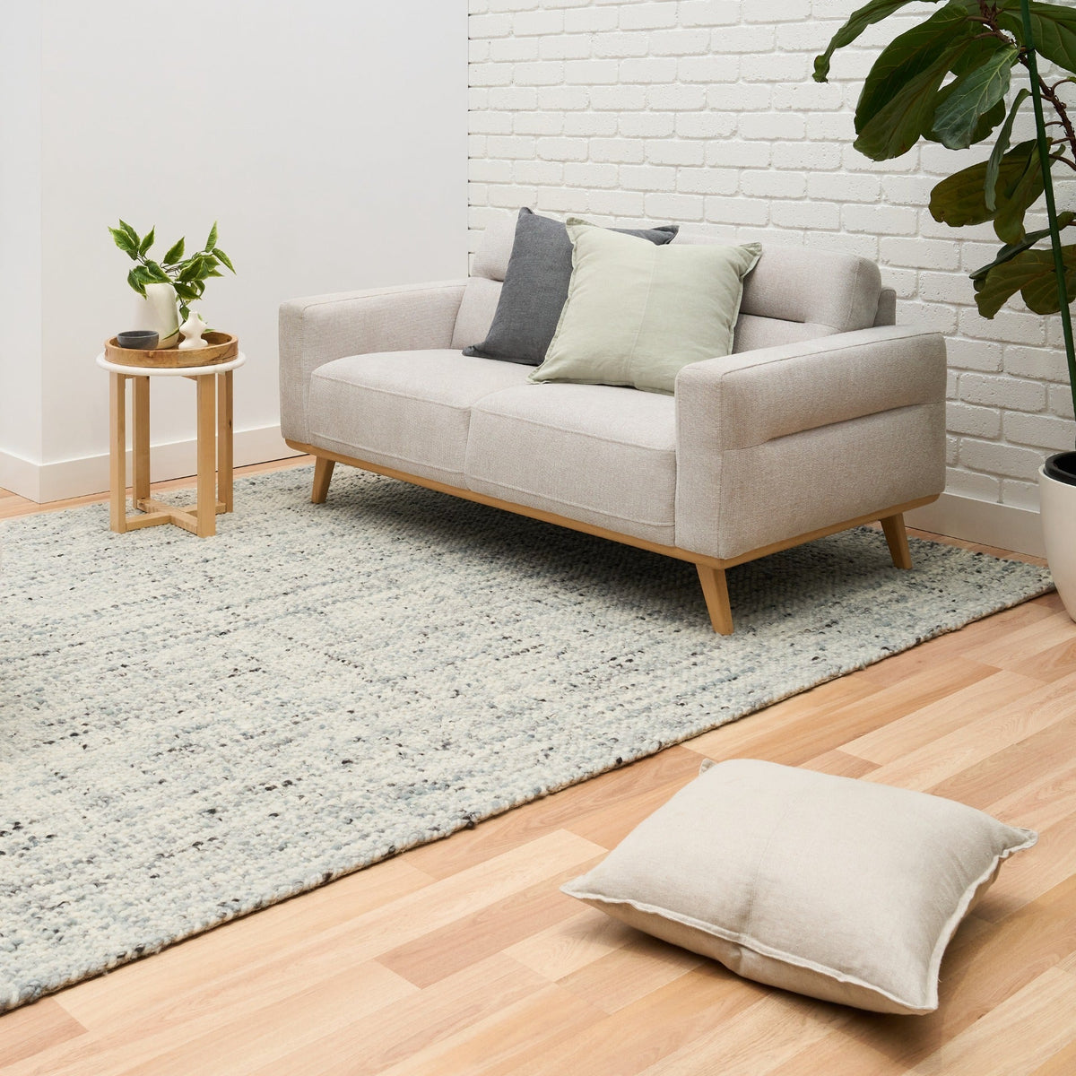 Cleo Blue textured area rug, light blue speckled design
