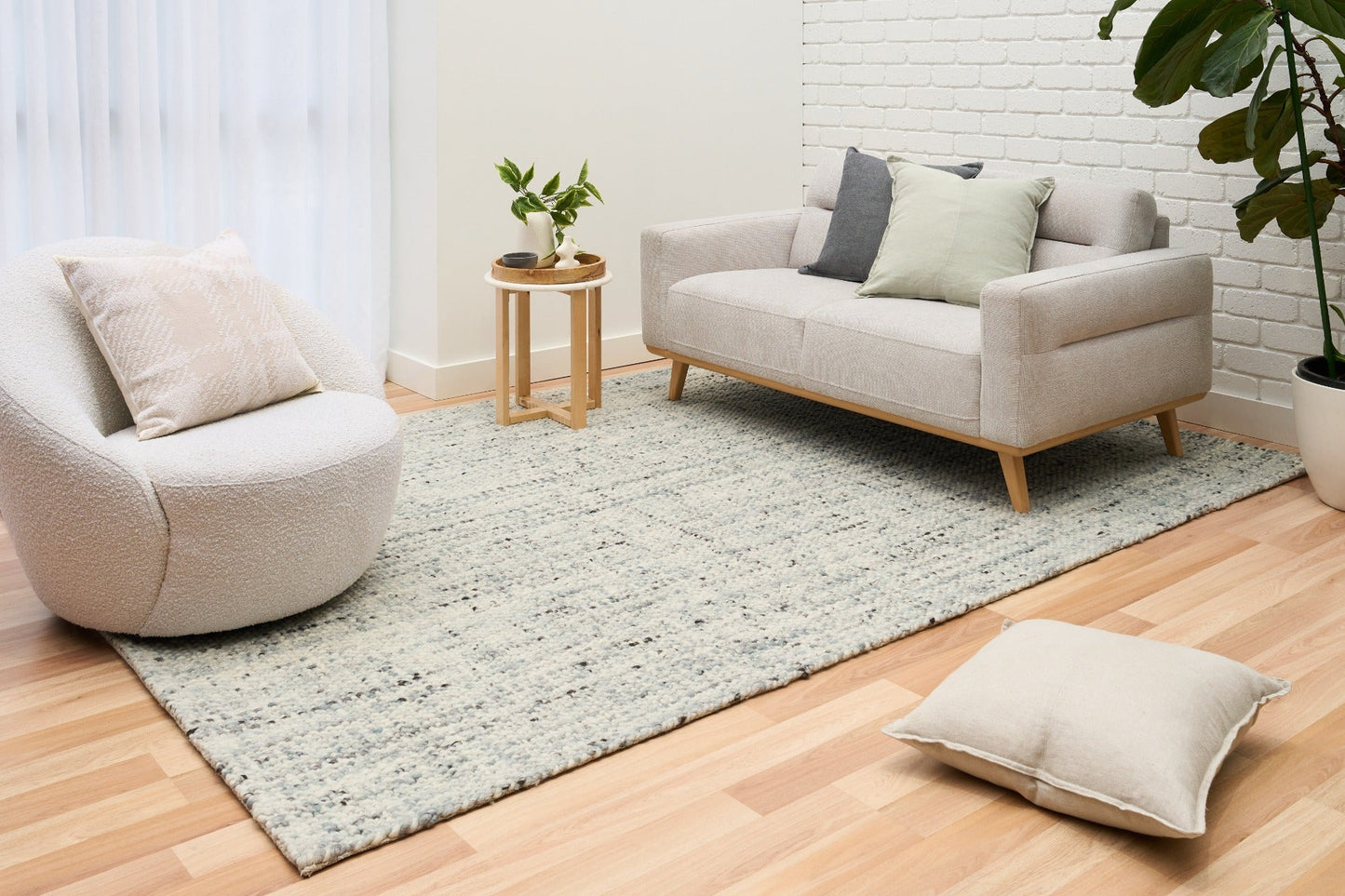 Cleo Blue textured area rug, light blue speckled design