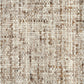 Wool rug surface close-up, beige base with brown and taupe flecks