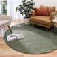 Olive green round area rug with textured woven fabric