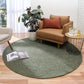 Olive green round area rug with low-profile woven texture, full view