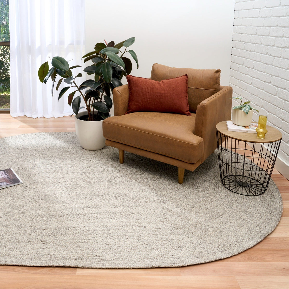 Cora Smoke area rug, light gray oval speckled woven texture with rounded shape