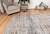 Ivory dark beige area rug with woven geometric grid and scattered multicolor speckles