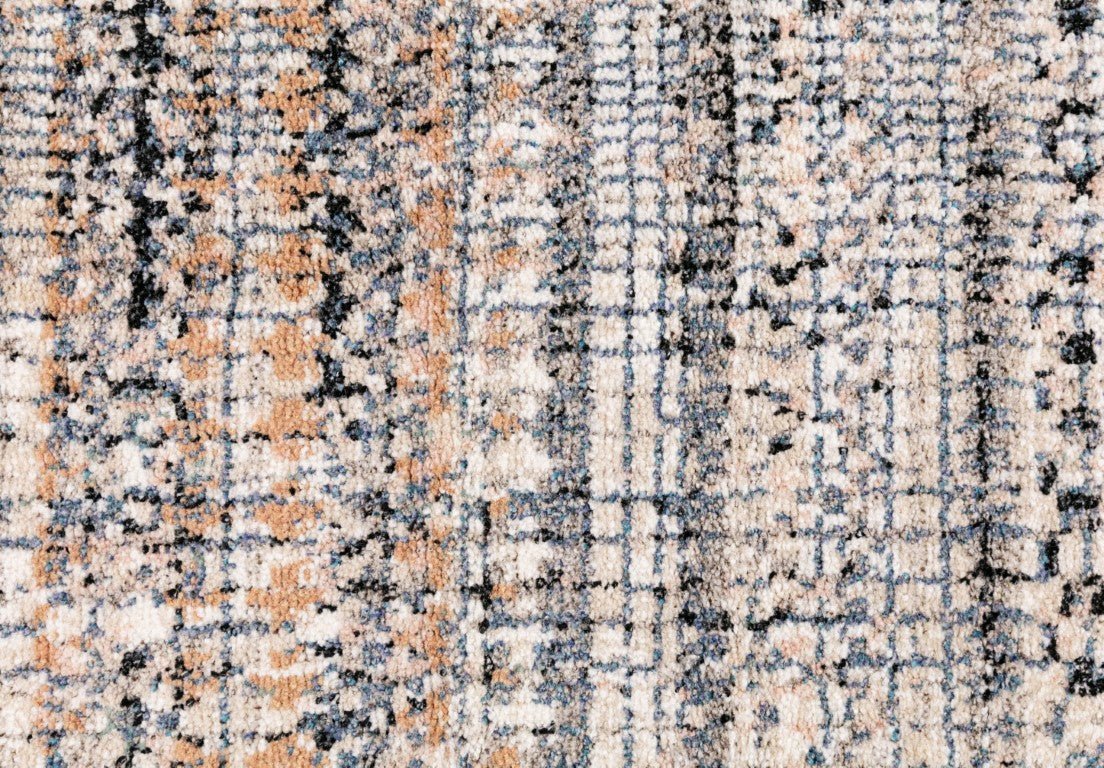 Ivory dark beige area rug close-up with mottled multicolor speckles and grid lines