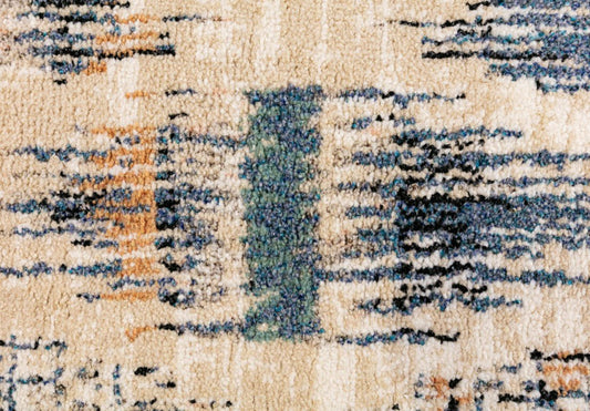Beige rug with navy-blue vertical and horizontal distressed lines, textured pile close-up