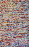 Multi-color wool large rug with textured woven pattern, close-up view