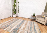 Beige area rug with blue and tan abstract pattern, polypropylene flatweave
