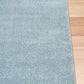 Blue speckled area rug with textured border detail on the edge. | Eclipse Katana Modern Abstract Polypropylene Area Rug - Rugs Point Australia