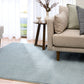 Blue speckled area rug laid on hardwood floor in a living room setting. | Eclipse Katana Modern Abstract Polypropylene Area Rug - Rugs Point Australia