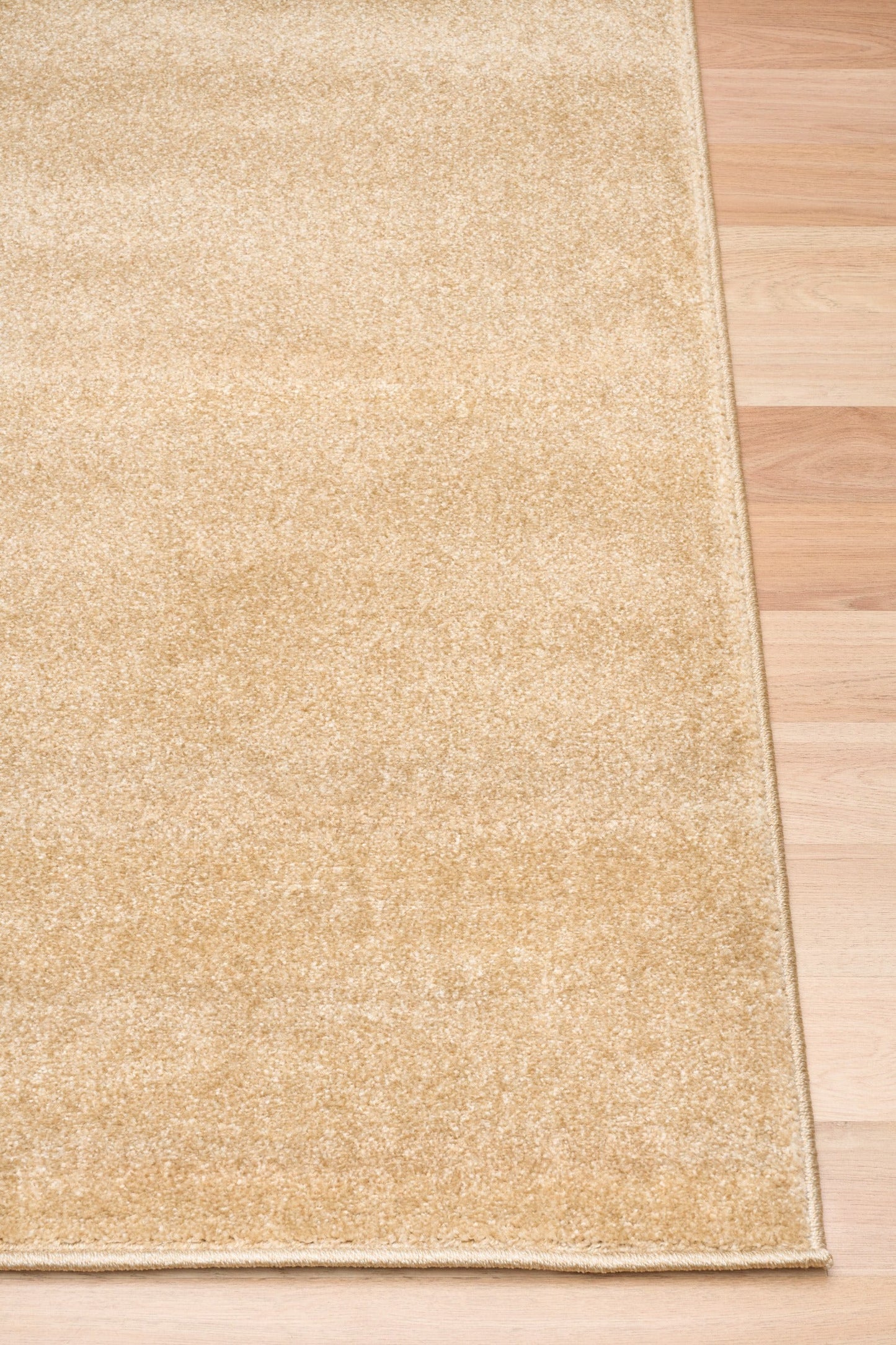 Beige area rug corner with flat weave texture and light border | Eclipse Nimes Modern Abstract Living Room Rug - Rugs Point Australia
