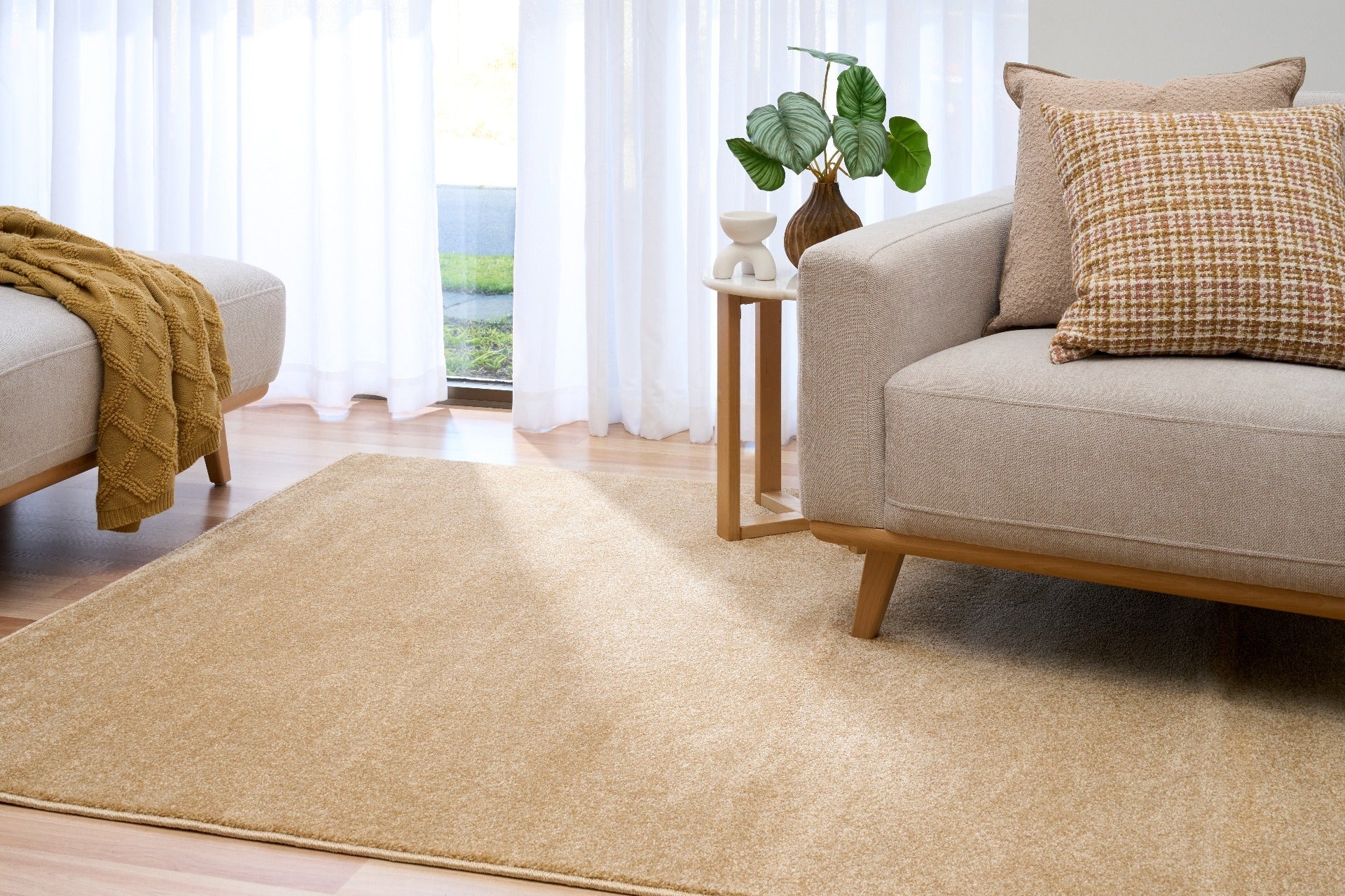 Beige area rug in living room setting on wood floor | Eclipse Nimes Modern Abstract Living Room Rug - Rugs Point Australia